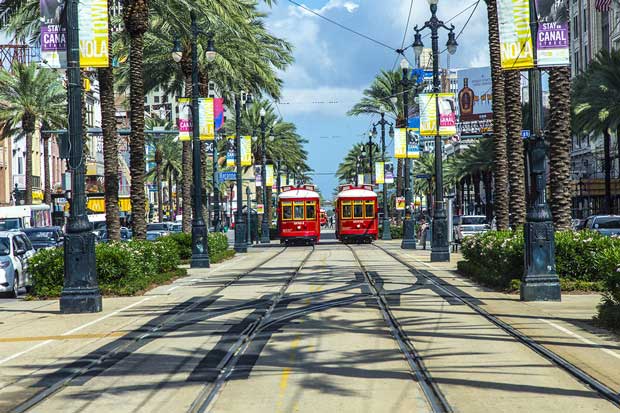 bigstock-Red-Trolley-Streetcar-On-Rail-511365251